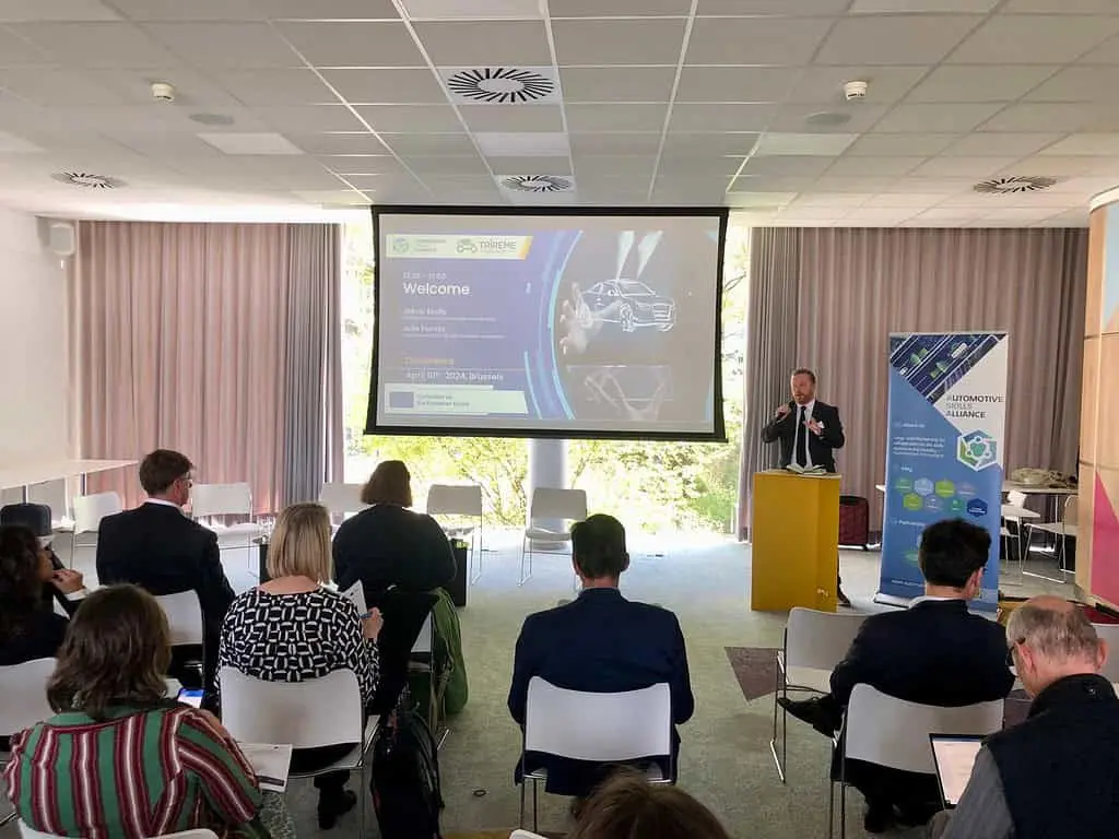A speaker addressing participants at the 2024 Skills (R)Evolution conference in Brussels